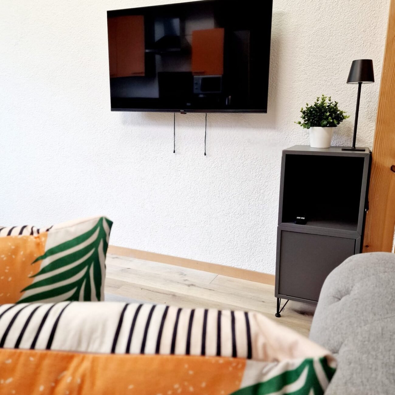 Casa Maria West couch seating aerea TV Apt